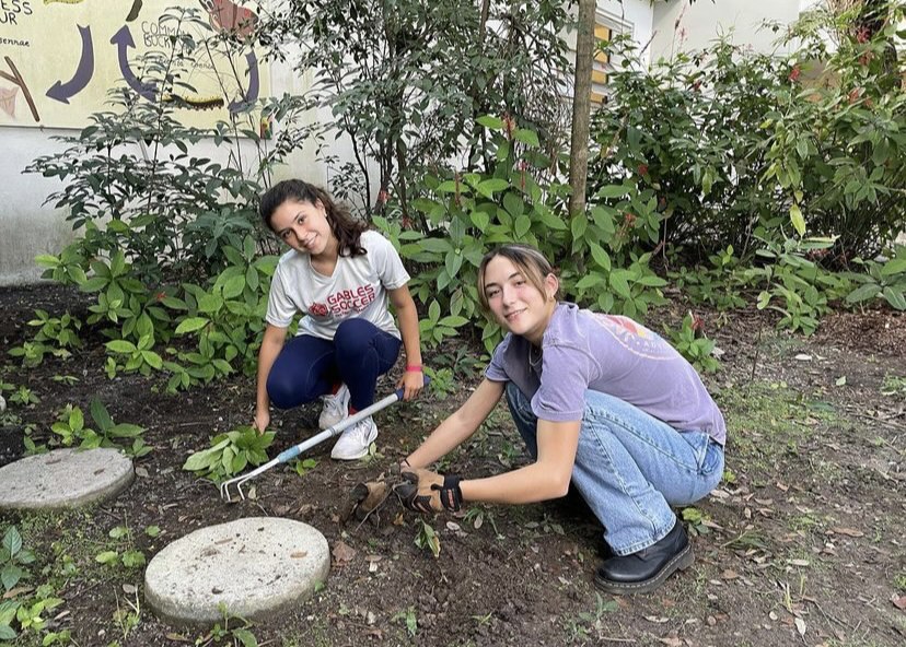 Members of the Garden Project paving the groundwork that leads to the new Butterfly Garden.