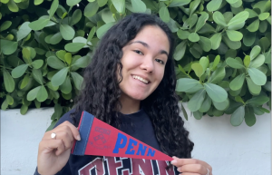 Natalia Pallas celebrates her acceptance into UPenn by wearing the universitys merchandise.
