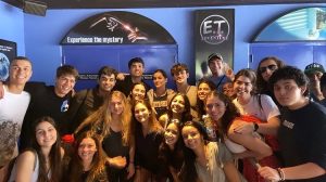 A group of 35 seniors joined together for a group photo before boarding the E.T. Adventure ride.