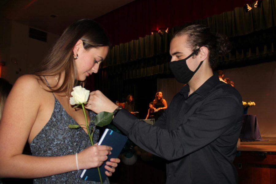 IB senior Julian Mesa pinning Kysa Mesa on her way down the alley. 