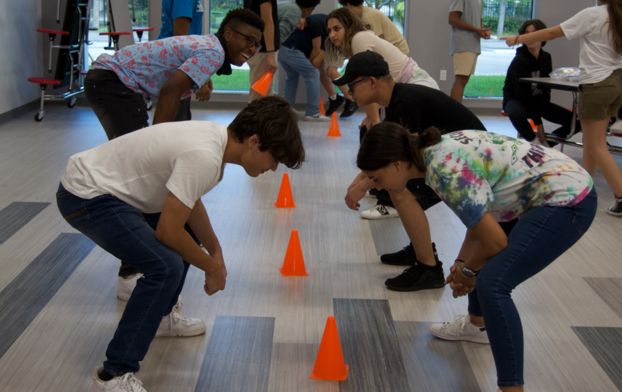 AOF held activities and games, such as Head, Shoulders, Cone that allowed students to compete against their future peers.