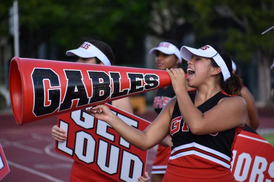 Gables cheerleaders excite the crowd for the first game of the fall season.