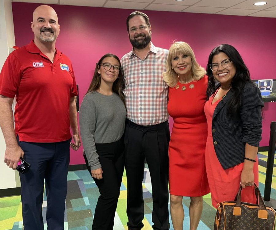 Senior Grace Urbita poses with Principal Mr. Ullivarri, School Board Member Mari Tere Rojas and others at her SYIP internship.