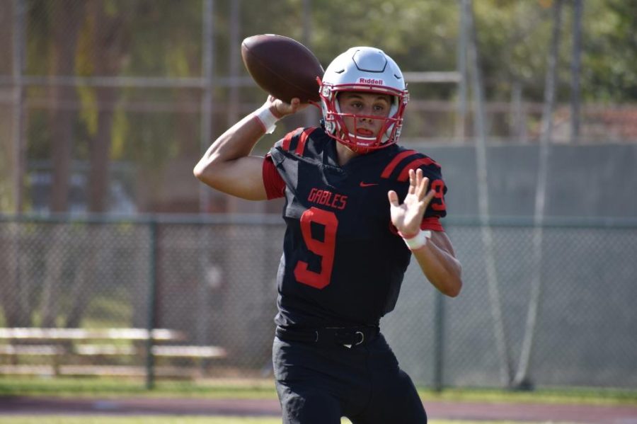 Quarterback Andreus Rios  getting ready to deliver an accurate pass to his receivers