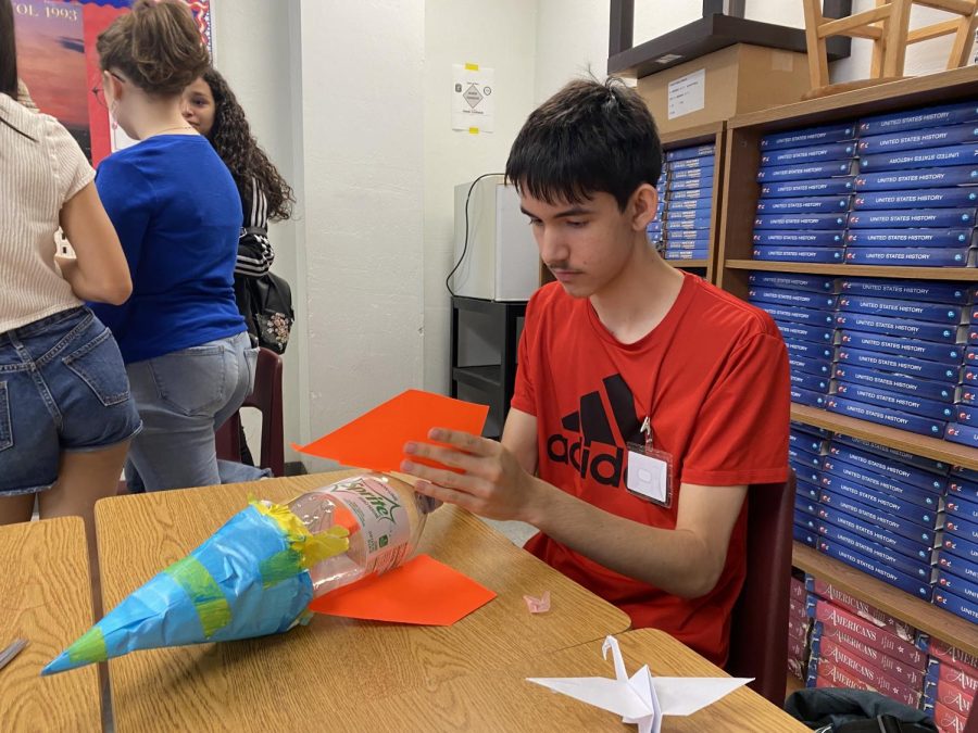 In preparation for the rocket launch competition, each group builds its own rocket.