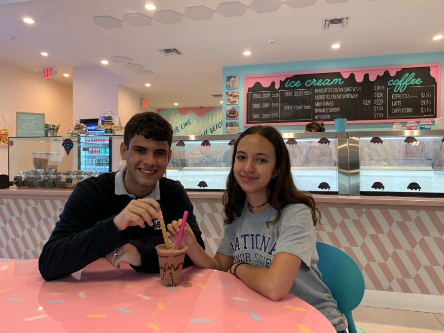 Seniors Nathaniel Leiva and Isabel Donner share a milkshake at La Glace.