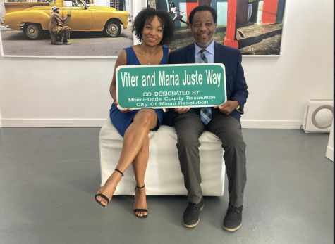 Fayola Nicaisse (left) and former commissioner Jeffery Watson (right), with whom the street sign change was completed.