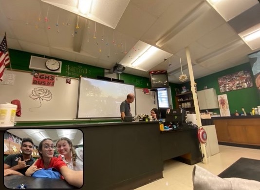 Posing during a lecture, students take their BeReal in Mr.Molina's biology class. 