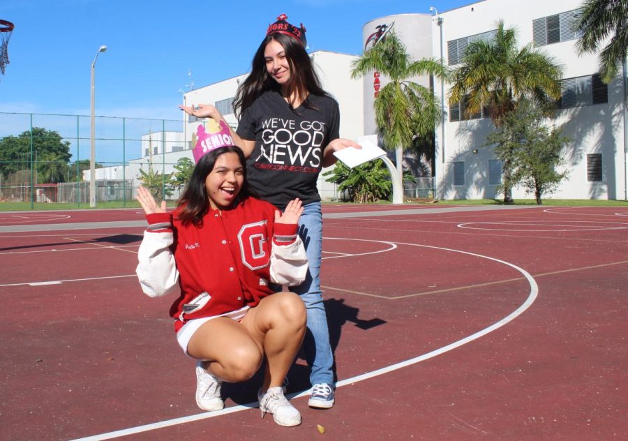 Seniors Julissa Villarreal (left) sporting her cheer uniform and letterman jacket and Arianna Hoyos (right) displaying her CavsConnect T-shirt, wear their senior crowns that they made and wore on the first day of their last year of high school.
