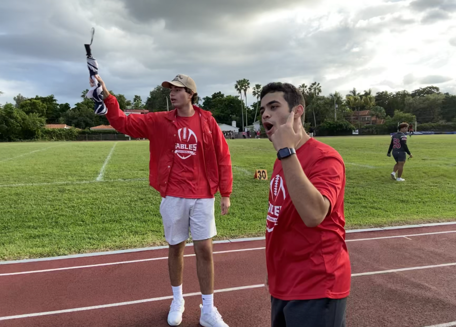 Junior Varsity coaches Ethan Kaddour-Moore and David "Dak" Kuper directing their players as they wrap up practice.