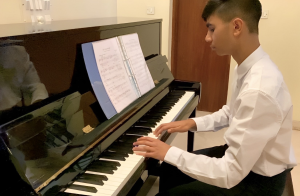 Remedios is currently practicing to pass his grade eight exam, the final piano test offered by the Associated Board of the Royal Schools of Music.