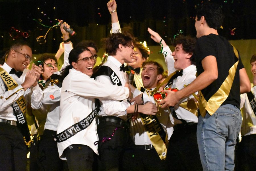 As the confetti canons popped, the contestant gathered around Brendan Groff, the winner of the 2022 Mr. Coral Gables pageant.