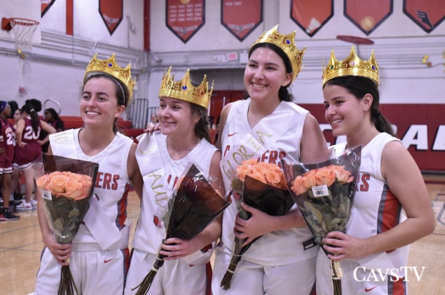 Seniors Isabella Morales, Audrey Simon, Gloria Arce and Melanie Garcia (left to right) were awarded their crowns and flowers after their victory.