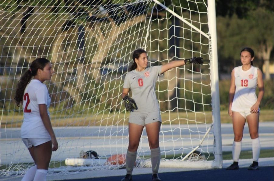 Adriana Muñoz communicates with her teammates during the district final game against Doral Academy.