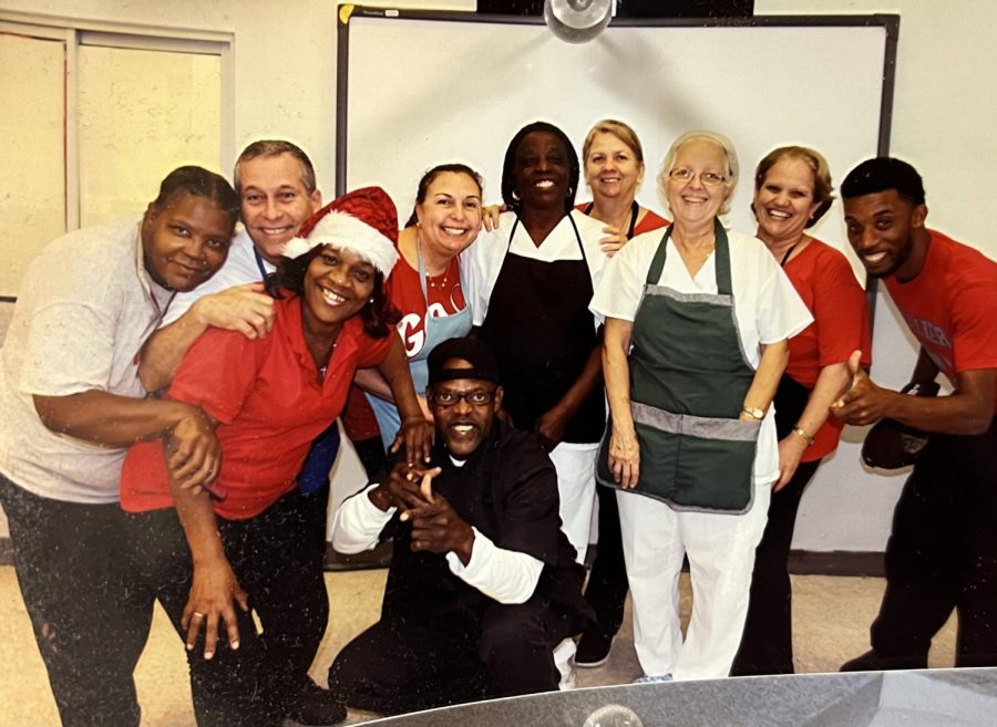 Mary Hodges (left) celebrated with her Gables cafeteria family for the holidays.