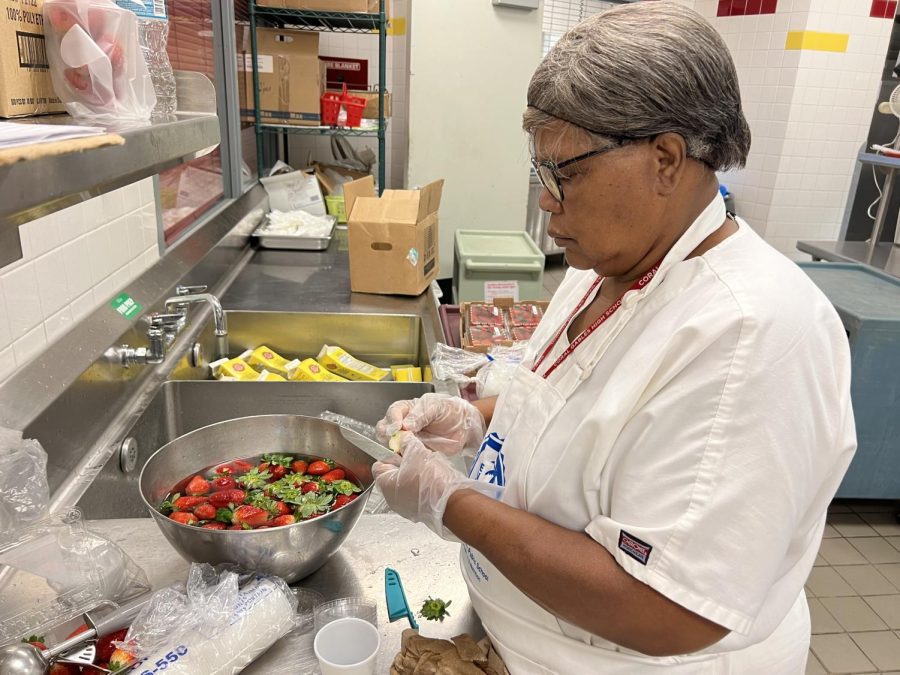 While ordering and calculating the cost of food shipment, Mary Hodges also takes a turn into the kitchen