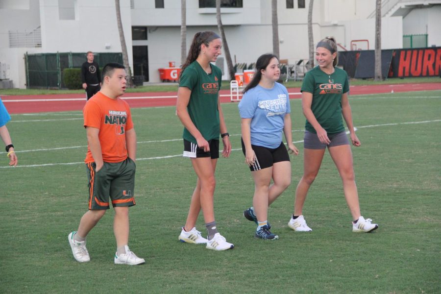 In a collaboration with the UM womens soccer team, both college students and participants in the soccer clinic got to play together.