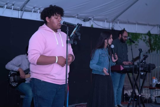 Participating actively within his church, senior Lenny Blanco is seen taking the audiences joyfulness from his singing.