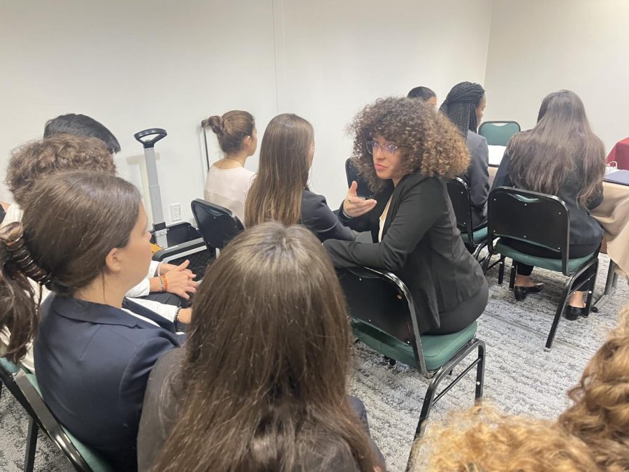 The Mock trial team practicing before their first trial of the day.