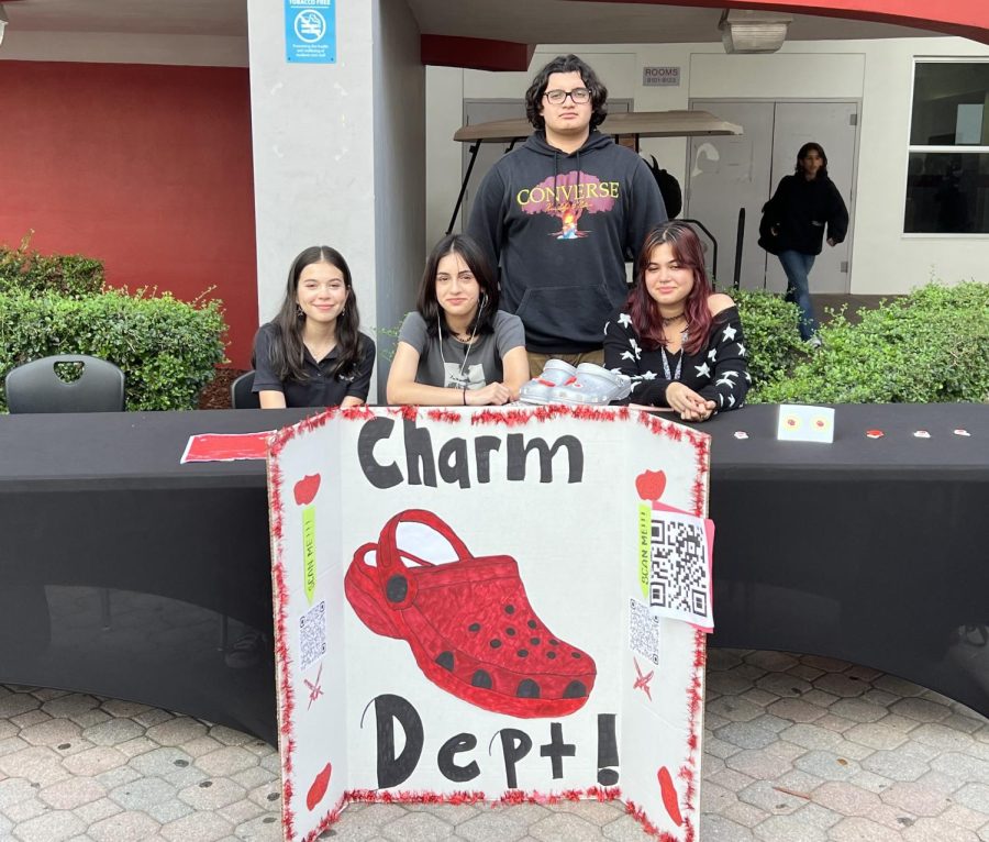 Selling their Cavalier Croc Charms in front of the 900-building, the Charm Department is prepared to tackle their JA Stock Market Challenge throughout March.