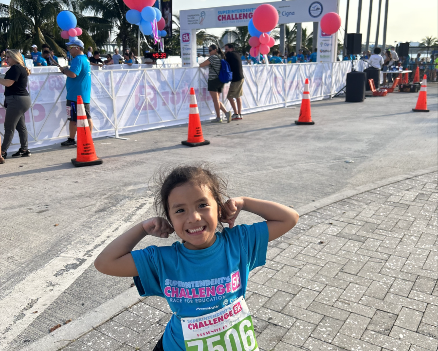 An M-DCPS student feels fulfilled and proud after running the Superintendents 5k race, an event open to all ages.