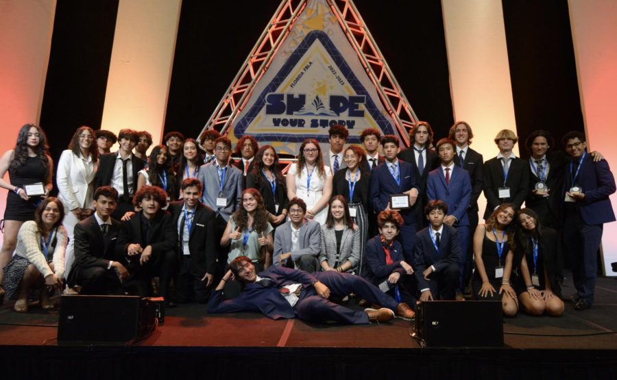 After the award ceremony, the FBLA members climbed up on stage to take a quick group photo.