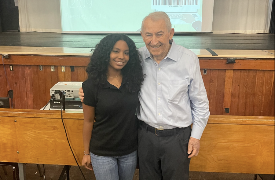 Holocaust survivor David Schaecter smiles with freshman Genesis Javier after his presentation.