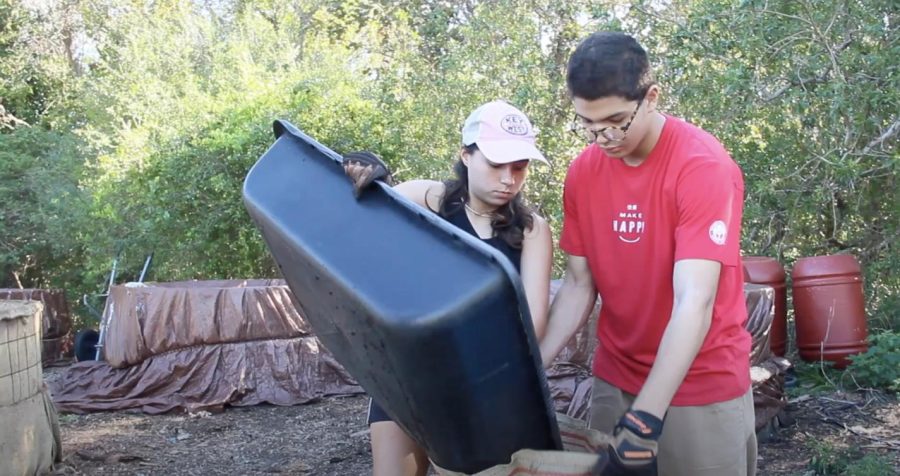 Students collect soil to take back to the gardens at Gables after spending a day learning about composting with Zero Waste Culture.