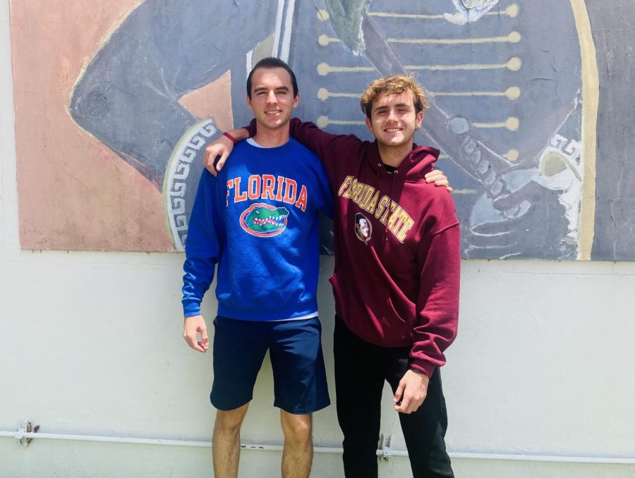 Anticipating his departure for Santa Fe College, senior Robert Weckel (left) shows his swagger for the University of Florida, where he plans to transfer his sophomore year. 