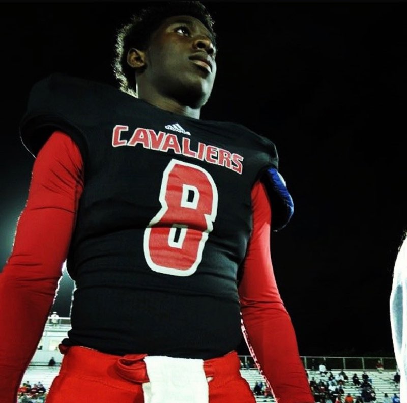 As running back for Gables football team, Class of 2014 senior Buddy Howell poses on the field, ready to take on yet another game with his team.