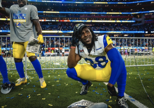 Gregory "Buddy" Howell smiles as he is crowned winner of the Super Bowl LVII, remembering his story to success. 