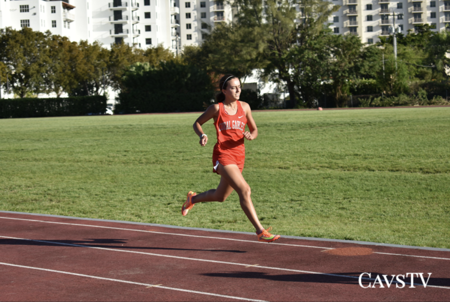 Senior+Isabella+Morales+dashes+to+the+finish+line+at+the+end+of+the+1%2C600m+race+on+Feb.+22