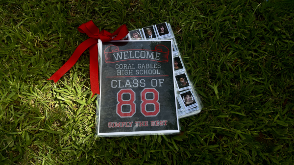 In remembrance of their high school years, the Class of 1988 brought their printed yearbook to share amongst themselves.