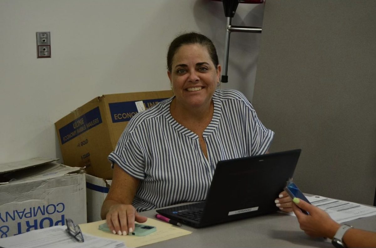 Mrs. Hernandez sits during the 2023 Academy of Finance Freshman Camp. During the event, incoming freshmen are introduced to the AOF program.