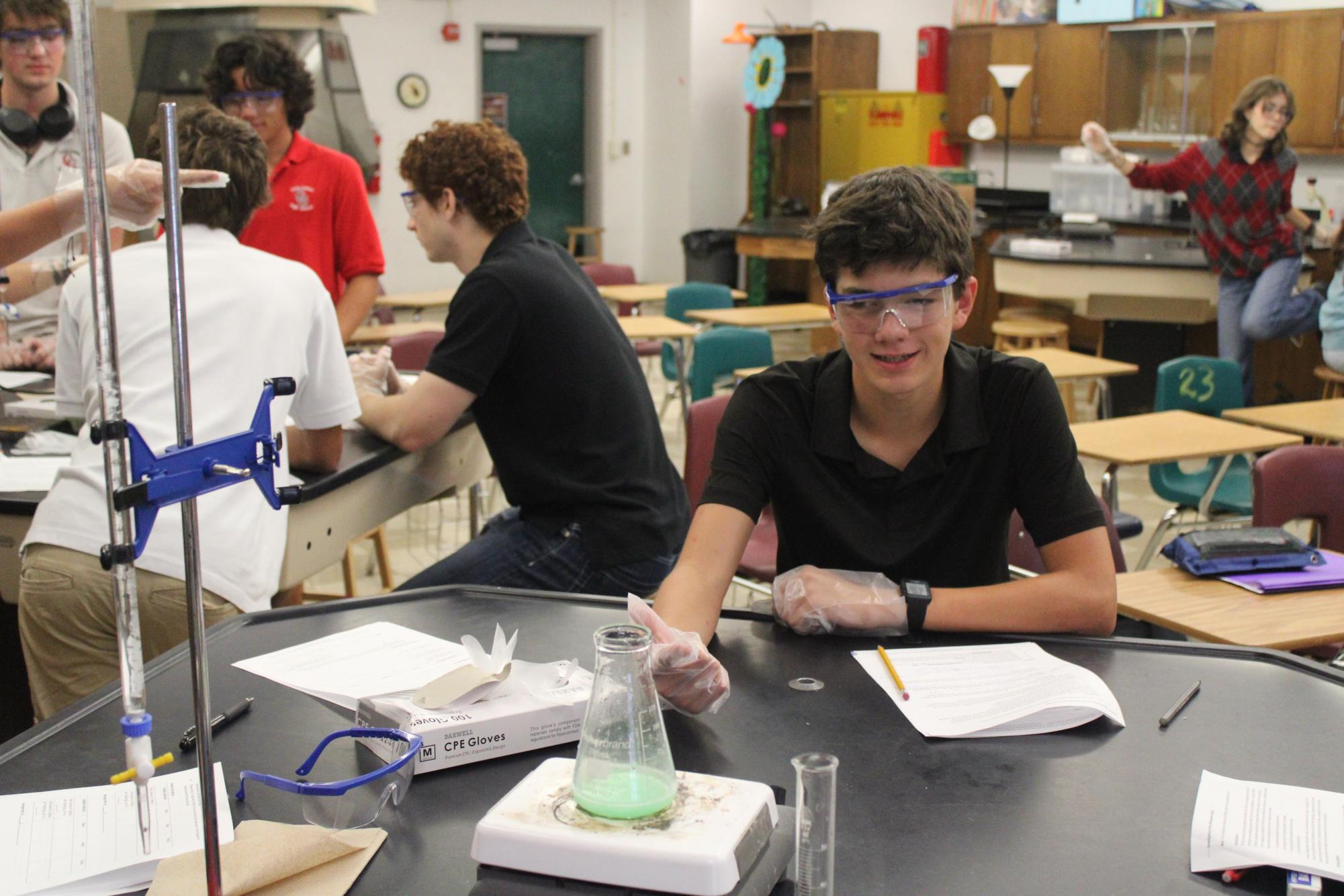 IB Chemistry Students Work to Neutralize Tablets with Hydrochloric Acid