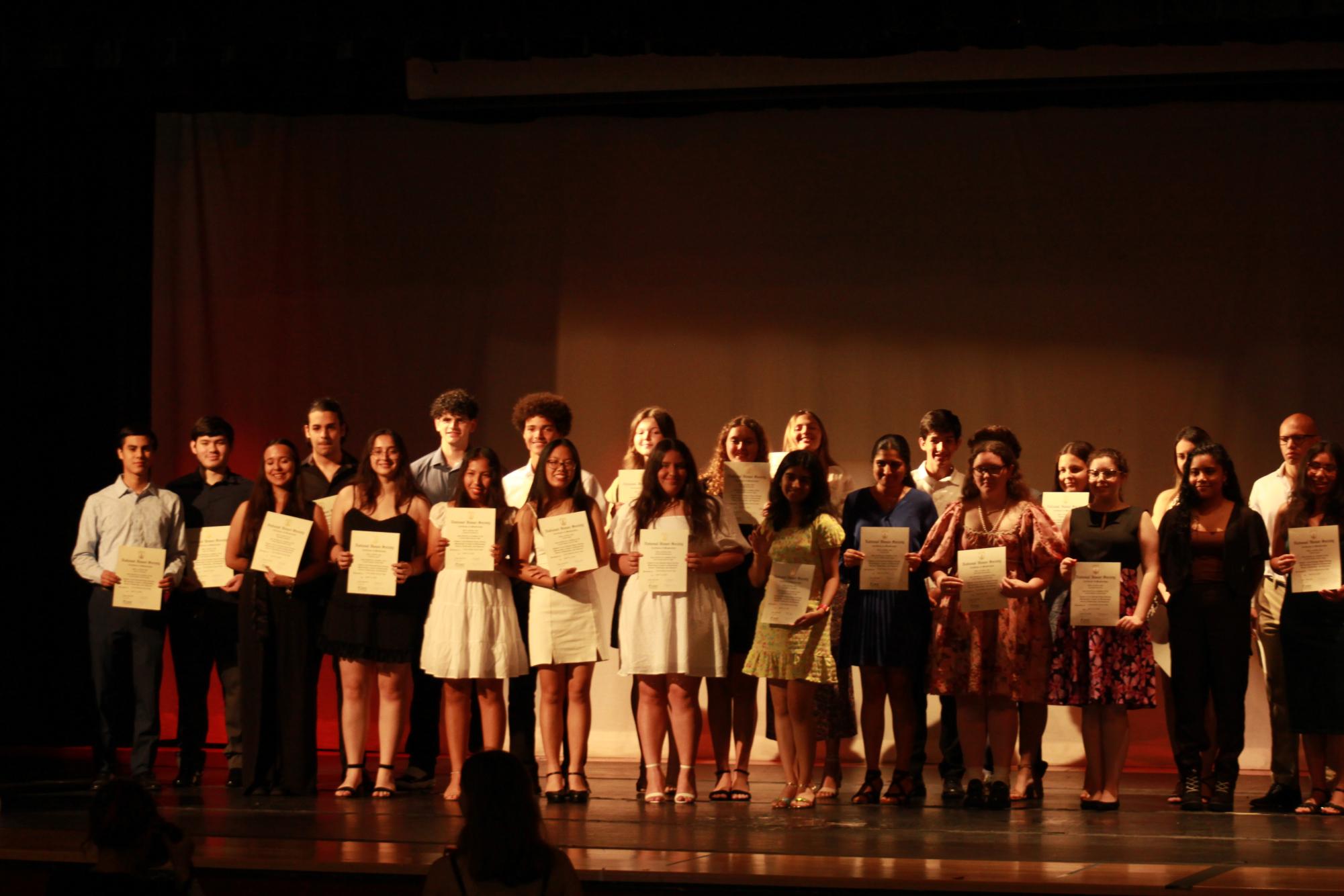 A notable group of Gables top students attend the National Honor Society 2022 Induction. Board members highlighted the criteria each member met to receive an invite to the event and handed out certificates. 