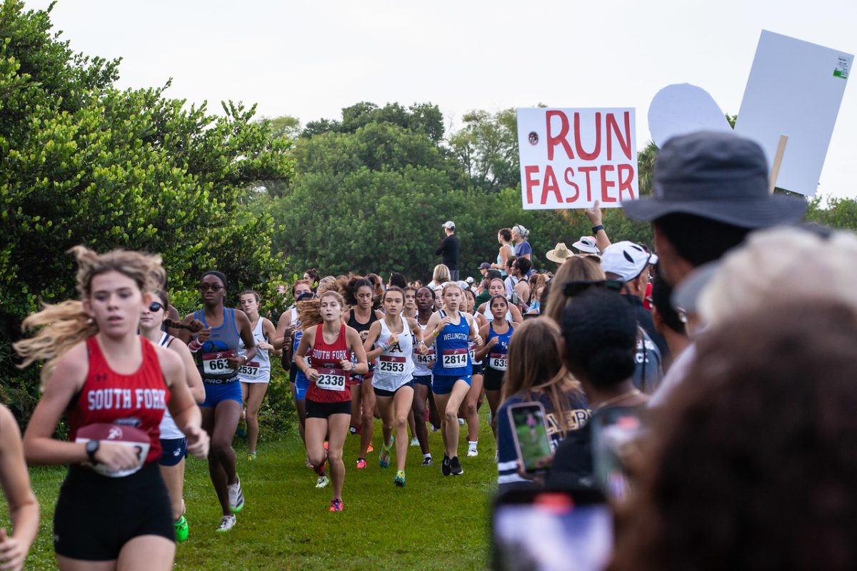 Parents and friends showed their support for their runners as they completed the course. 