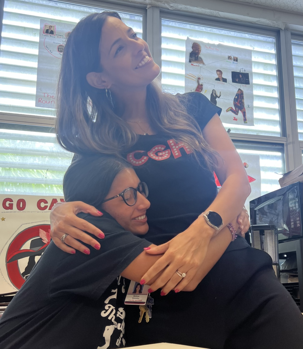Maria Jose Cestero and Ms. Gonzalez happily hug each other during the last week of Cesteros senior year.