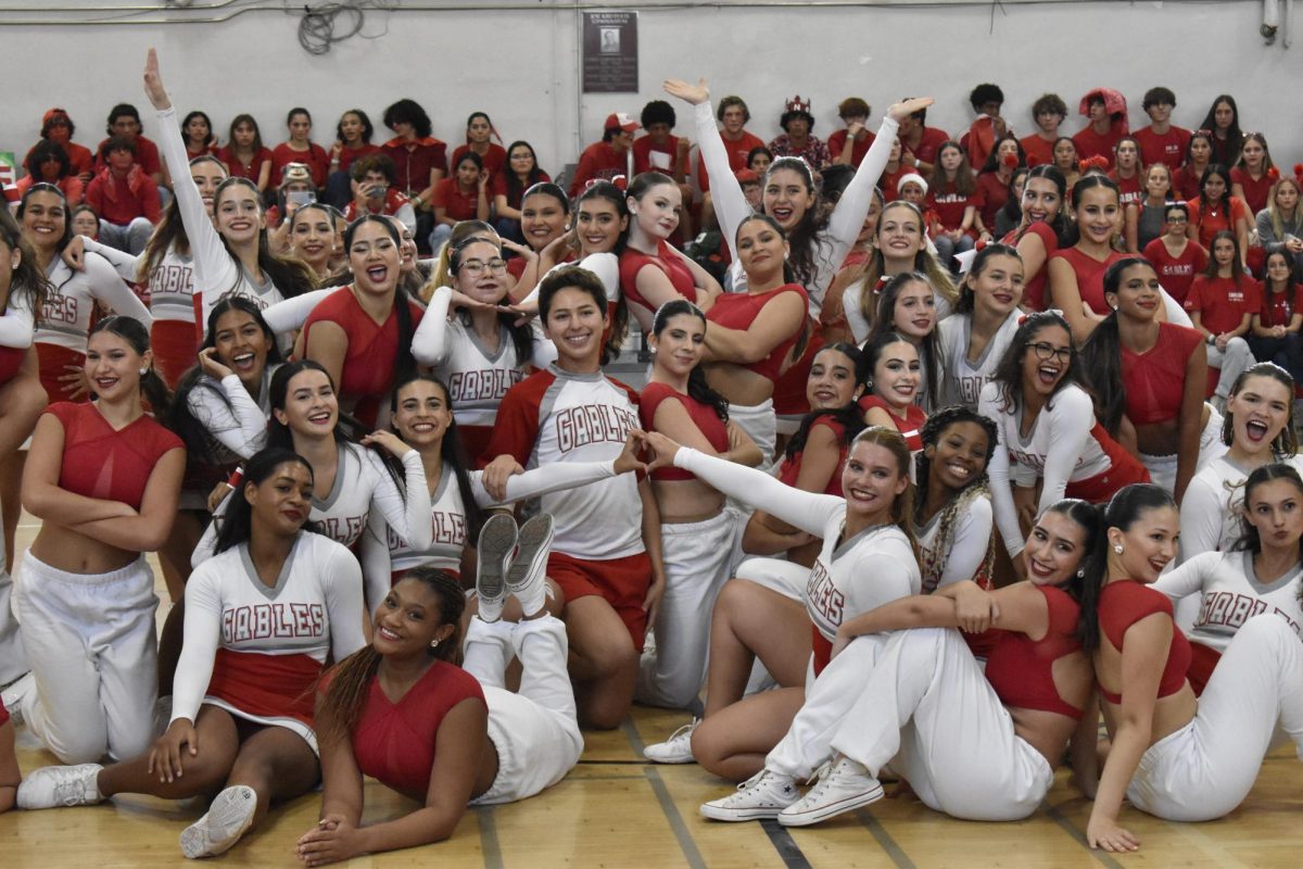 Gablettes and cheerleaders pose as one  large team during their performance at the first pep rally of the 2023-2024 school year.