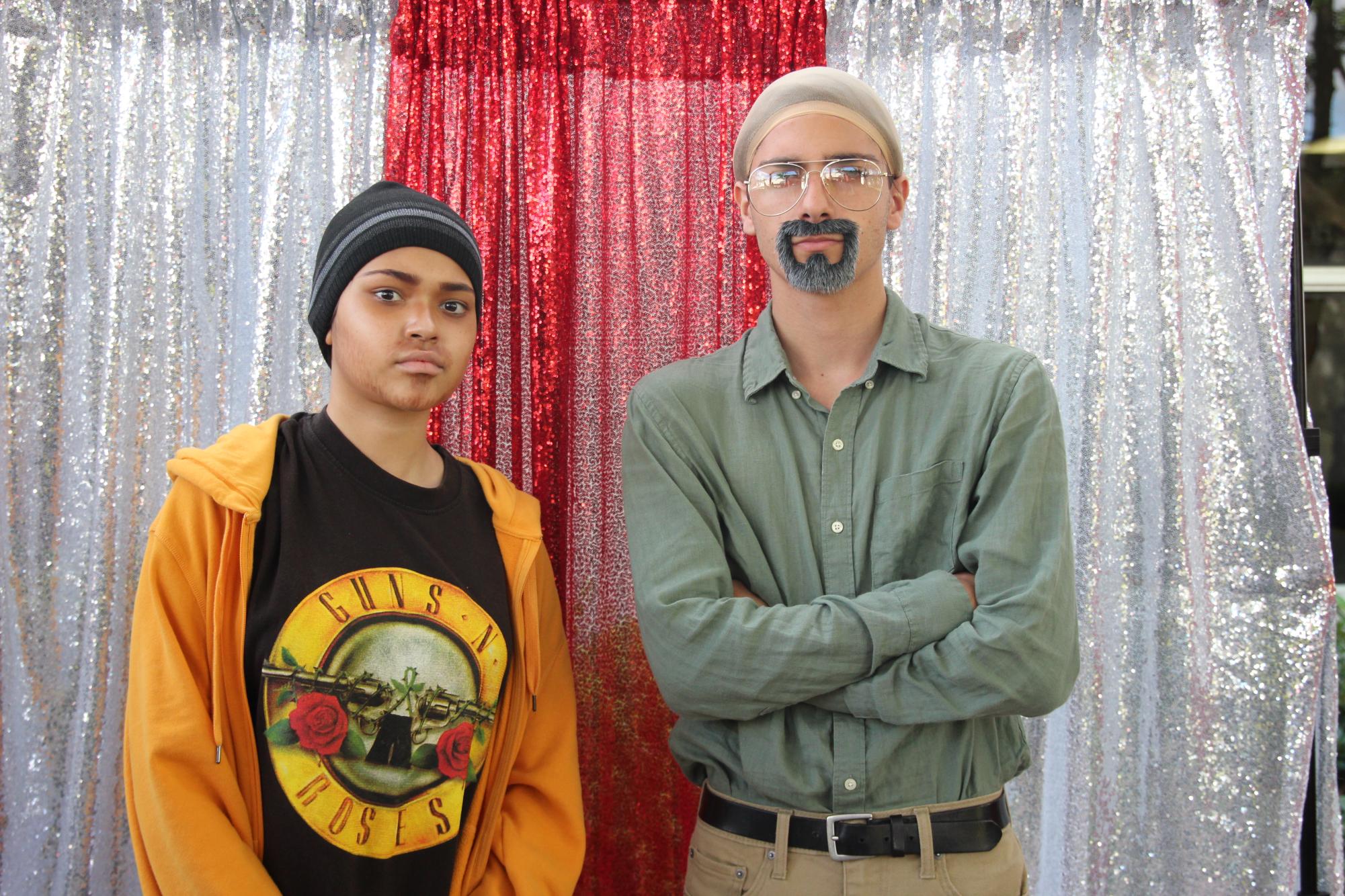 Dressed as the dynamic duo from Breaking Bad, Jesse Pinkman and Walter White, students embody their characters personalities for a pose. 