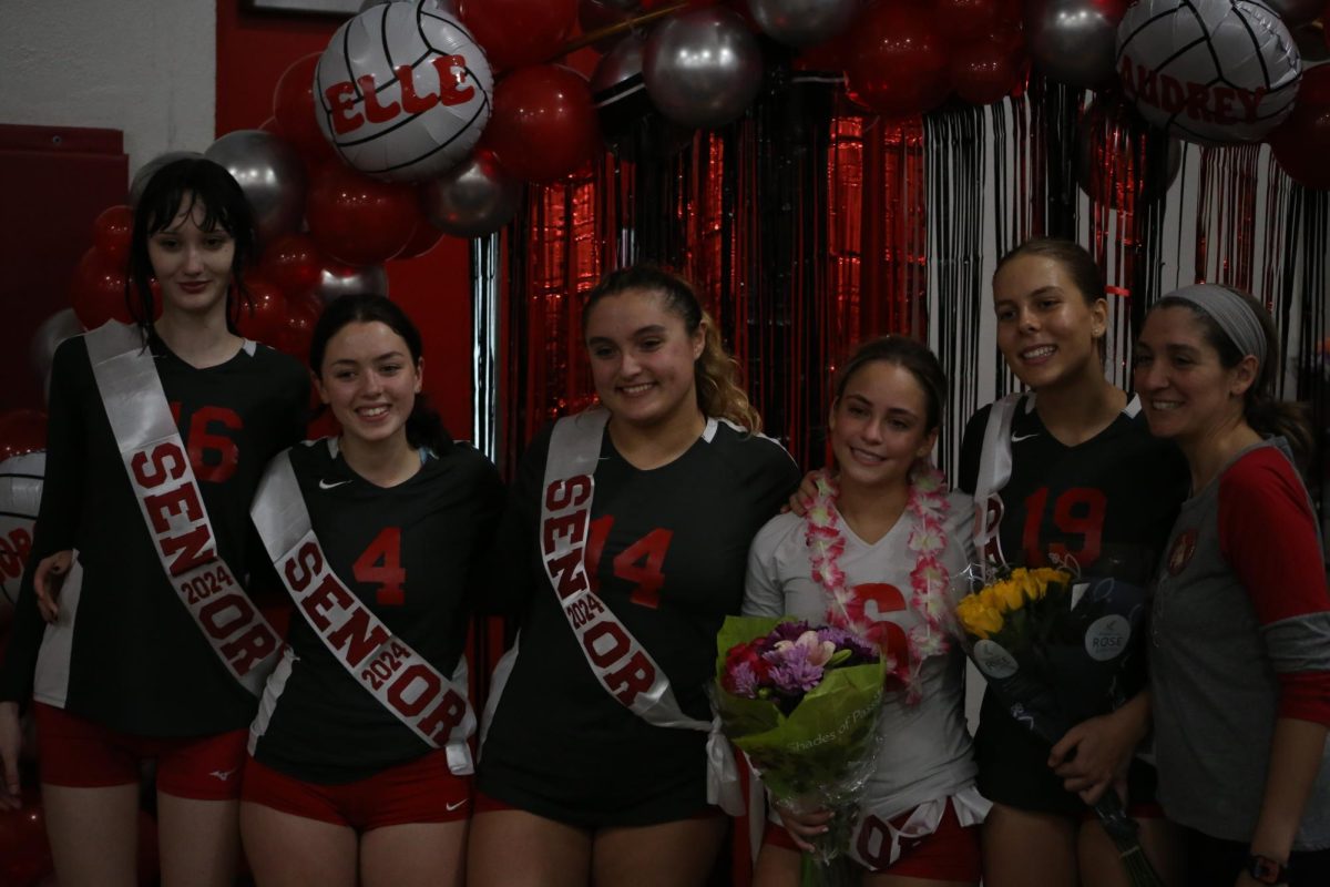 Seniors Andrea Mase, Georgia Rau, Elle Kardatsky, Madison Mendoza and captain Audrey Noval wave goodbye as today was their last home game of the season.