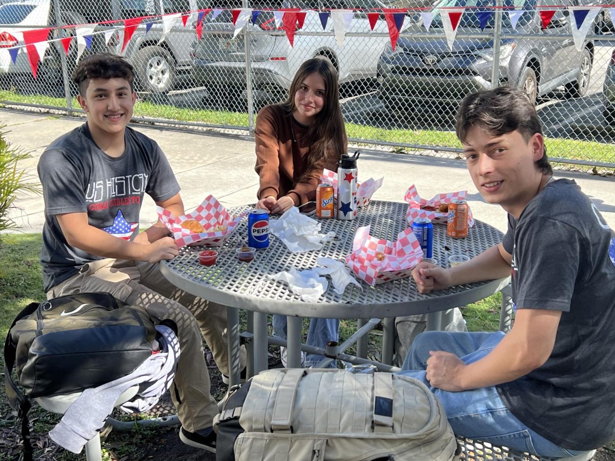 Spending time with friends, the passing seniors enjoyed lunch outside of the auditorium