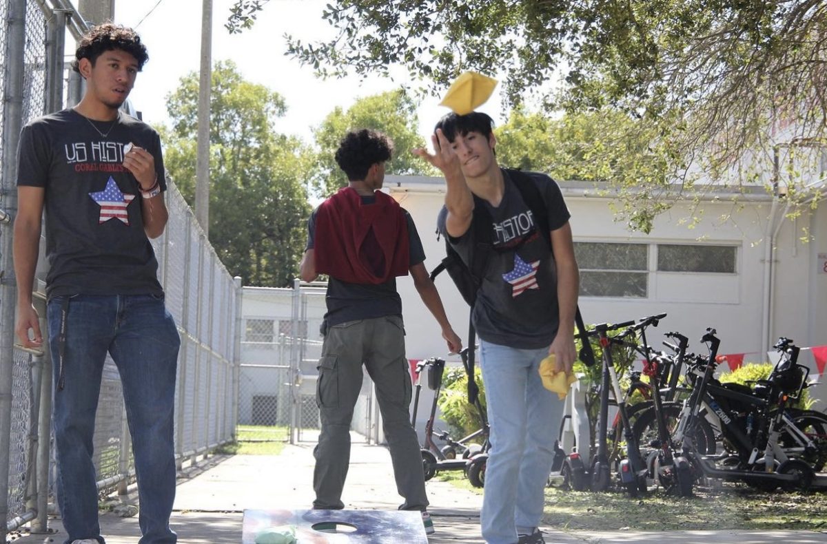 Besides enjoying lunch, seniors got to get competitive by tossing sacks in a game of cornhole.