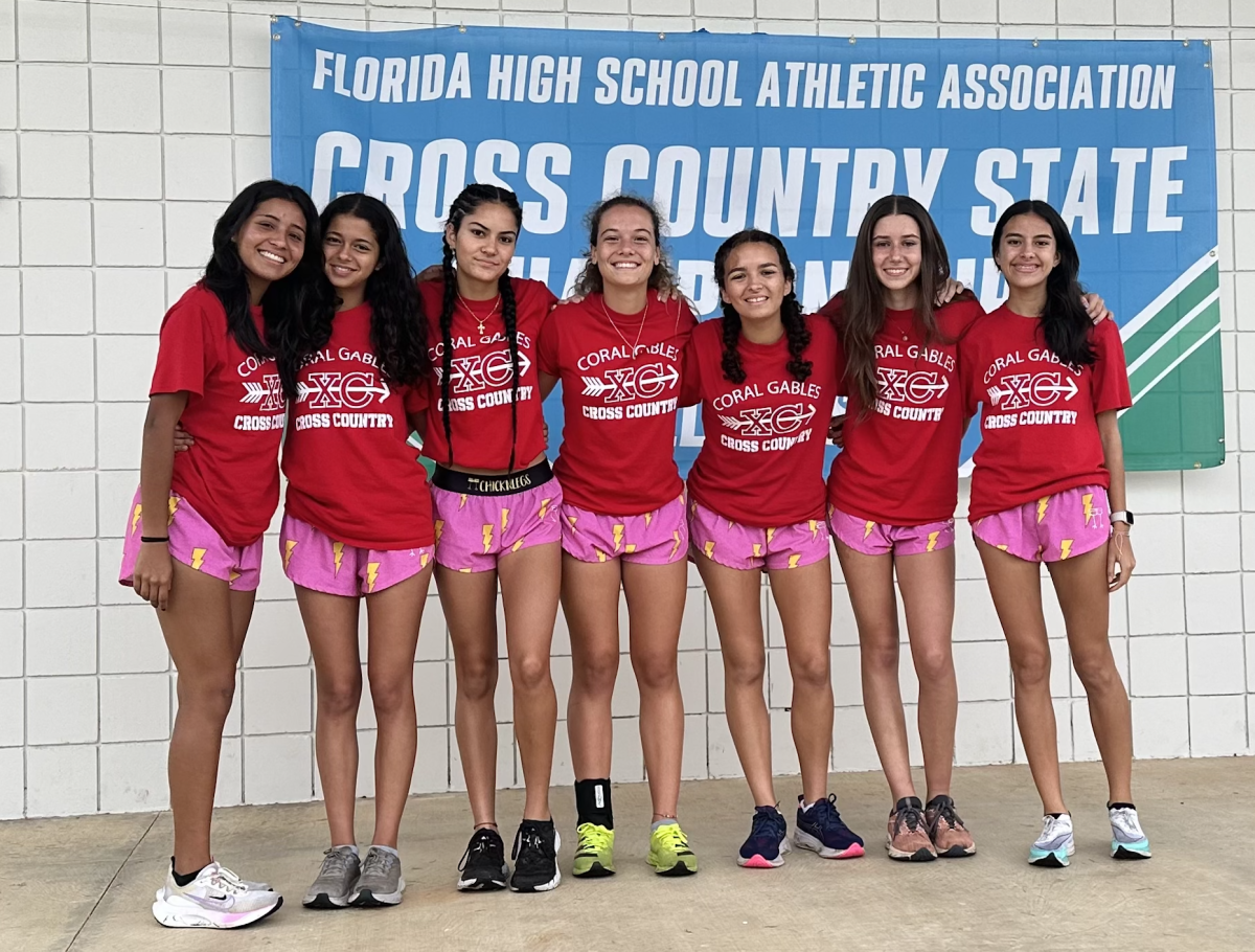 The girls cross country poses the day before the race. They all got matching shorts.