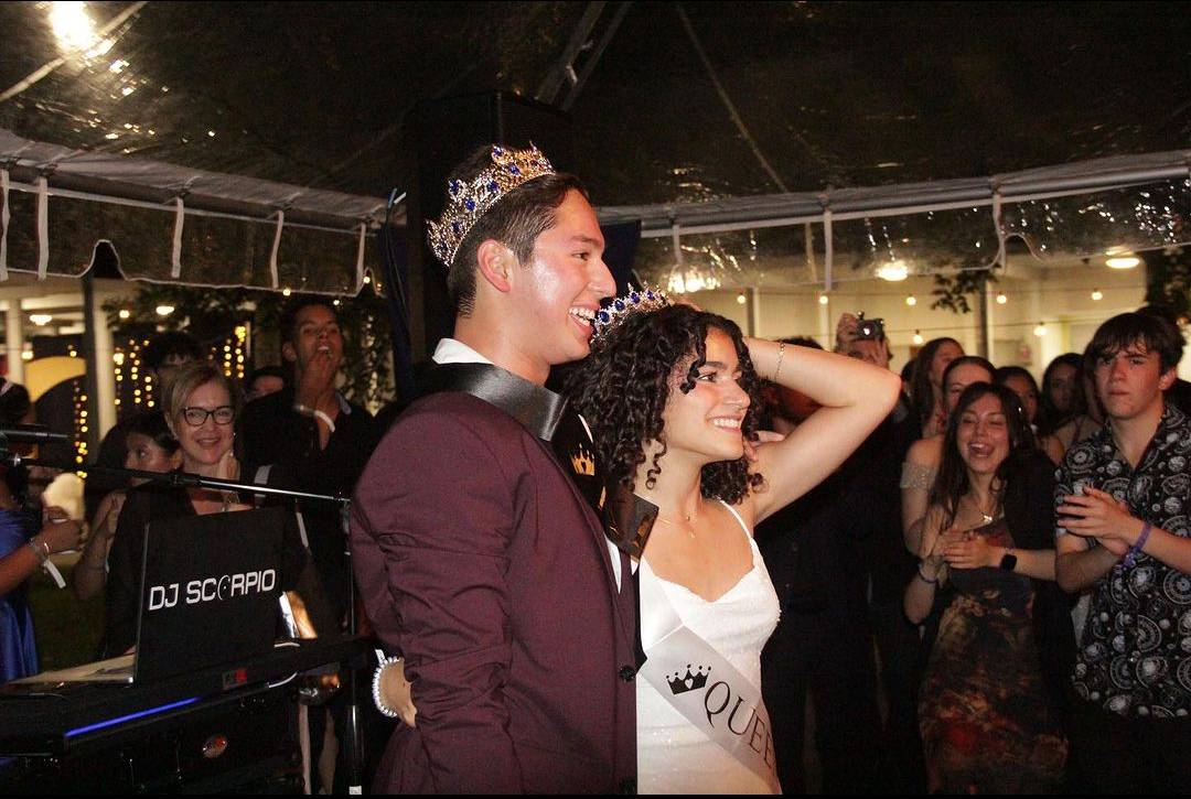 Seniors Santiago Giraldo and Amalia Garrido pose for picutures after their successful win as Homecoming King and Queen.