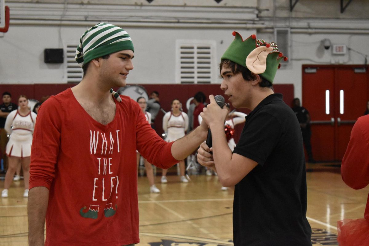 Senior Antonio Rodriguez tests his Christmas caroling knowledge in a game of Finish The Lyric.