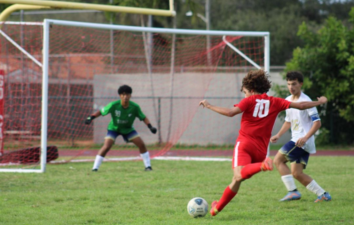  Sky Carrizo dribbles through Maimis defensive line and prepares to propel the ball into their net. 