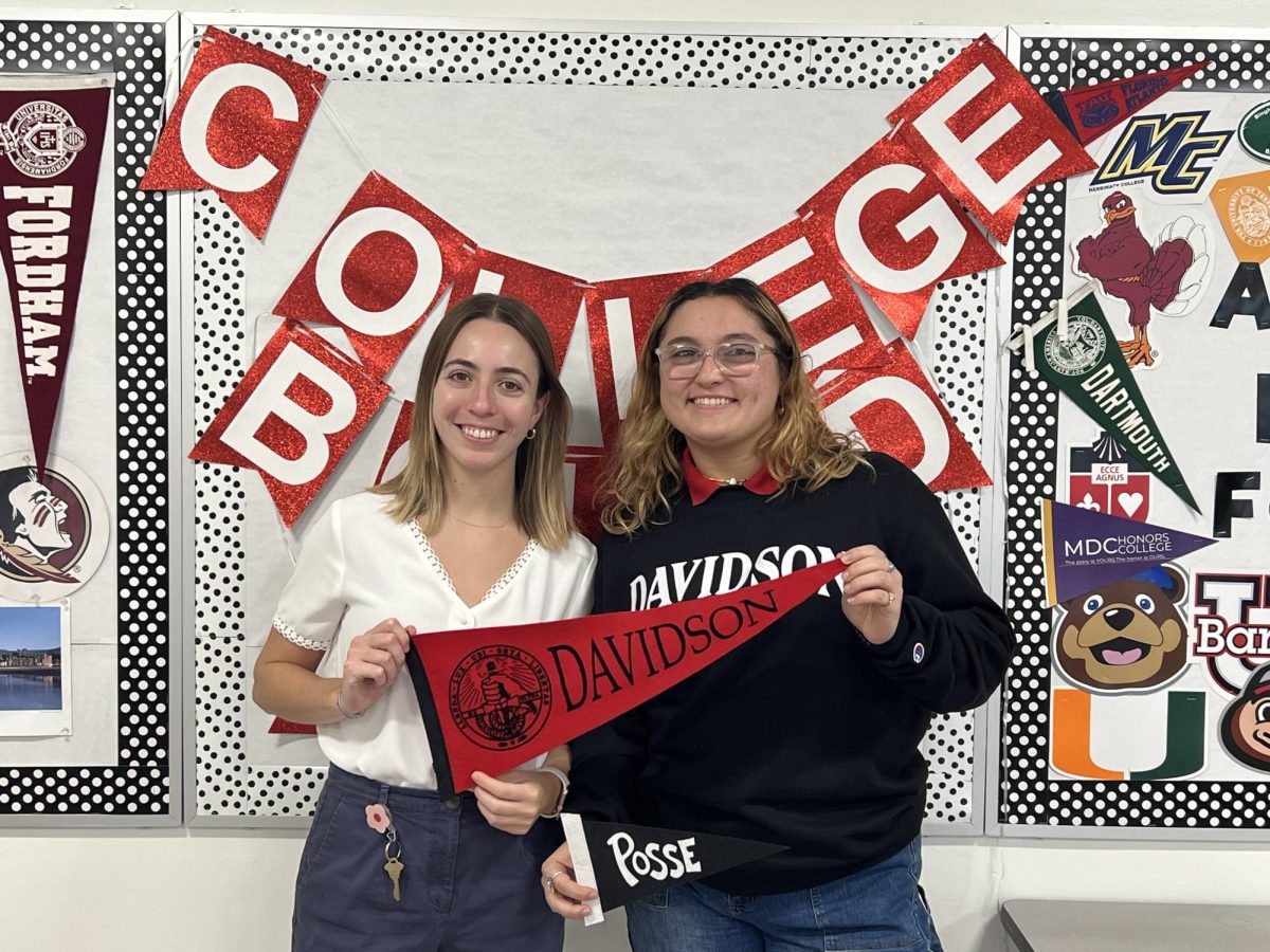 Mendoza proudly stands next to CAP Advisor Mrs. Sanz who helped her journey through becoming a Posse finalist.