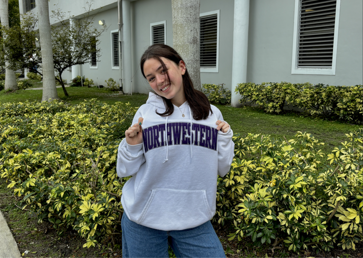 Senior Georgia Rau shows off her Northwestern University gear, knowing her path is yet to be discovered. 