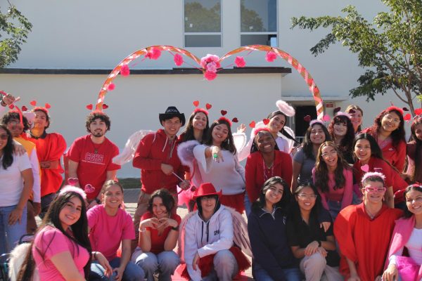  The interact members participating in the Valentines Day event express their spirit with the hues of love. 